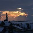   Winterlandschaft mit Kirche im Abendrot                             